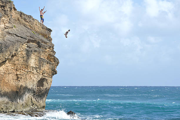 Cliff Diving in Kauai, Hawaii USA stock photo