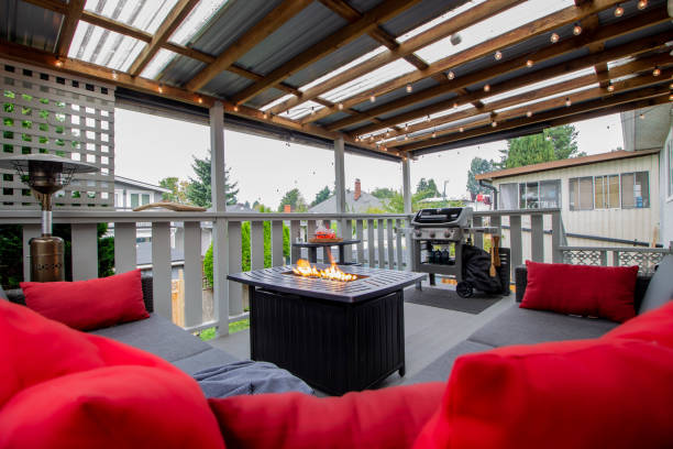 istock Deck with fire pit, outdoor furniture, and with a beautiful day setting 1644989539
