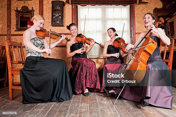 String Quartet Stock Photo - Download Image Now - Cello, Smiling, Viola - Musical Instrument