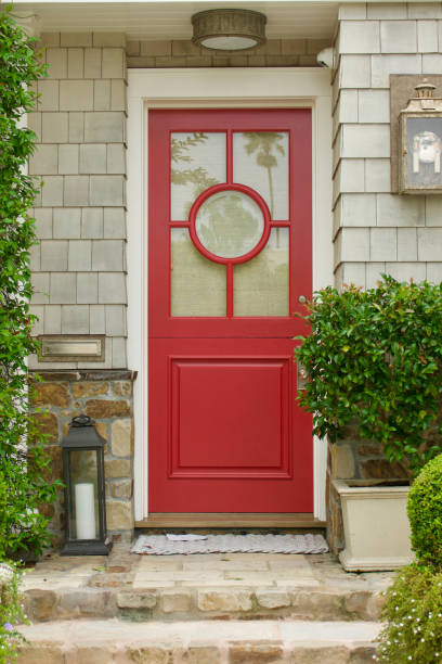 istock Beach bungalow with bright red front door 1645108625