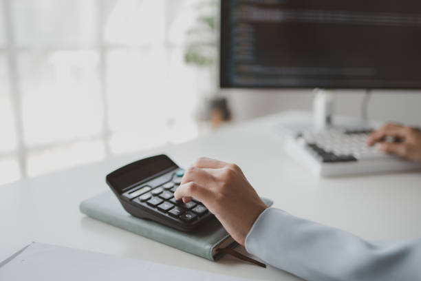 istock Person working with documents on desk, accountant checking company budget accounting documents, auditing financial statements, preparing company balance sheet financial statements. Audit concept. 1645157863