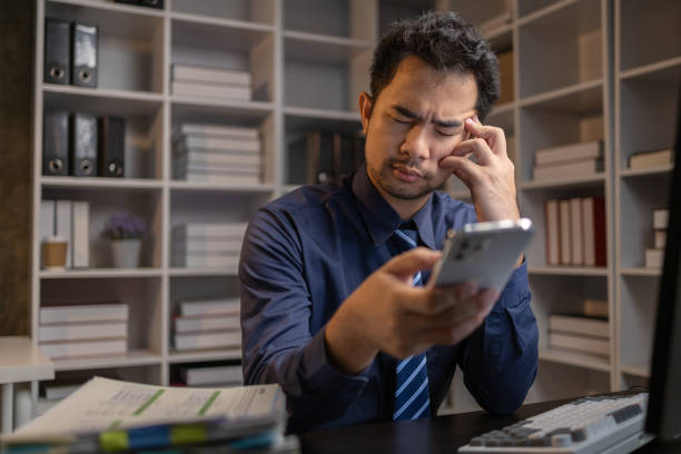 istock Startup company employees work overtime and work hard causing stress and fatigue from work, office syndrome, exhausting work makes the body tired. Overtime concept and office syndrome. 1645163730