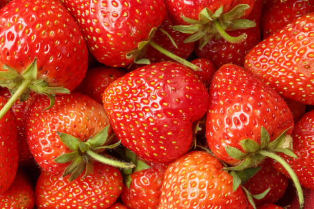 istock Fresh organic red strawberry fruit background 1645217263