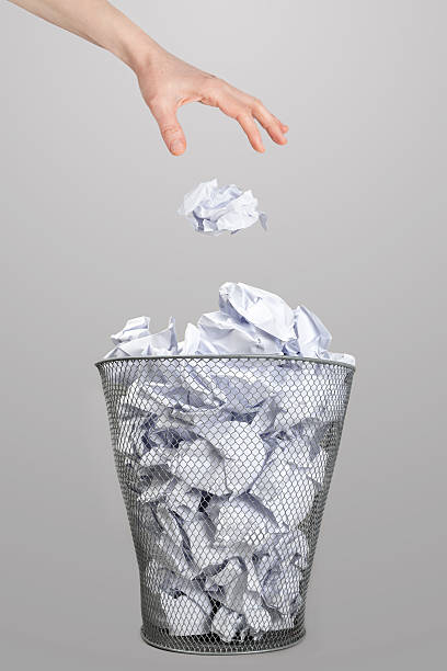 istock The hand of woman and garbage 164522463