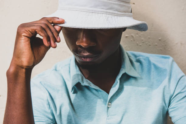istock young black man with hand holding 1645231919