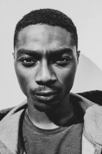 istock Close up black and white serious young African American man 1645232468