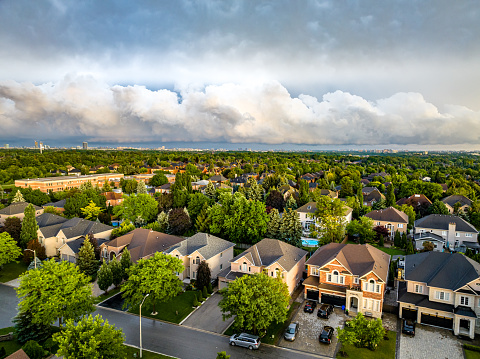 Aerial view of single family homes, a residential district near river in East Brunswick New Jersey USA