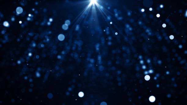 istock Particles Blue dust abstract light bokeh motion titles cinematic background 1645329678
