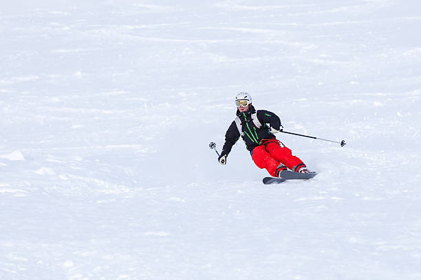 Skier turning in powder snow stock photo