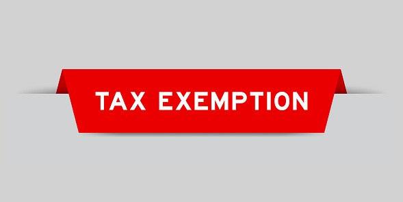 Red color inserted label with word tax exemption on gray background