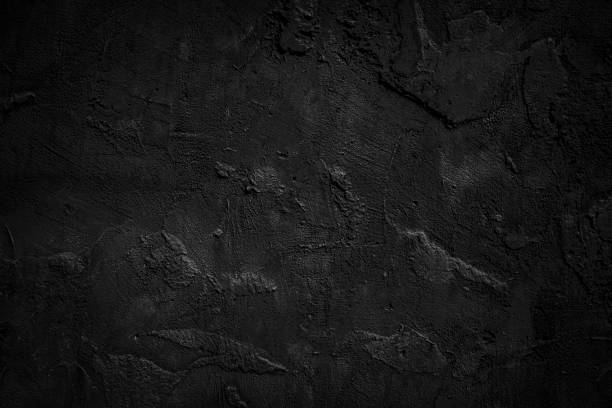istock Dark black concrete wall background with rough texture. grunge black cement background 1645453647