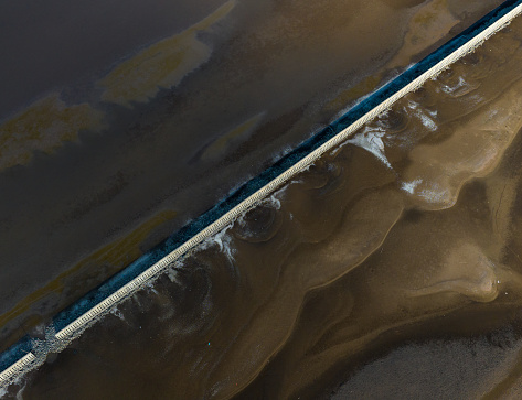 Tan Thanh beach with black sand mixed with alluvium typical of the Mekong Delta