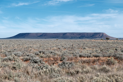 Red soil outback of Australia arid semi-desert areas around Broken hill mining town - wide aerial landsape panorama.