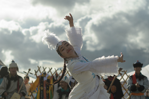 Ulaanbaatar, Tuv, Mongolia - August 12, 2023: Kazakh girl is dancing. Nomads world cultural festival Mongolia