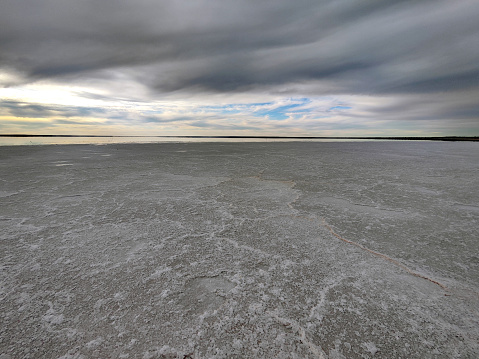 Salty surface view of Lake hart, a large salt lake near the town of Woomera, South Australia.