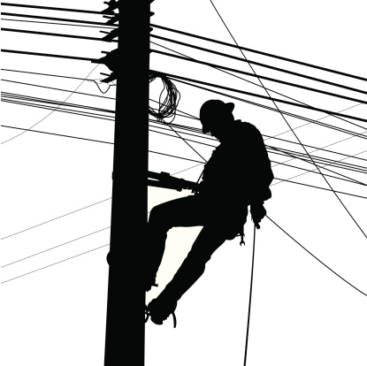 Electrician working with power lines