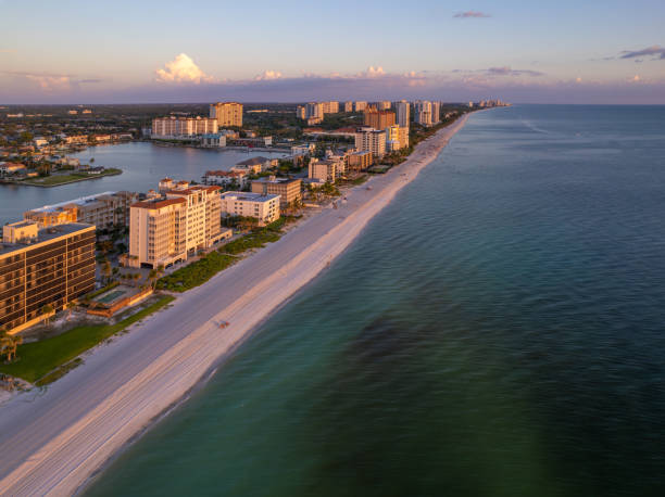 istock Aerial drone photo Naples Vanderbilt Beach Florida, at sunset 1645530480