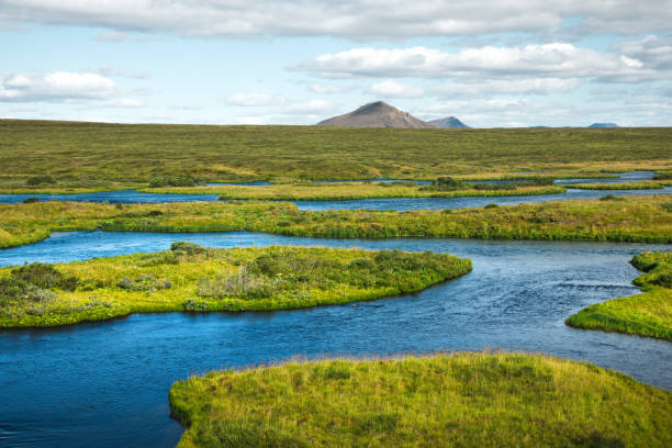 Idyllic landscape with the Laxa river in Iceland on a sunny summer day.