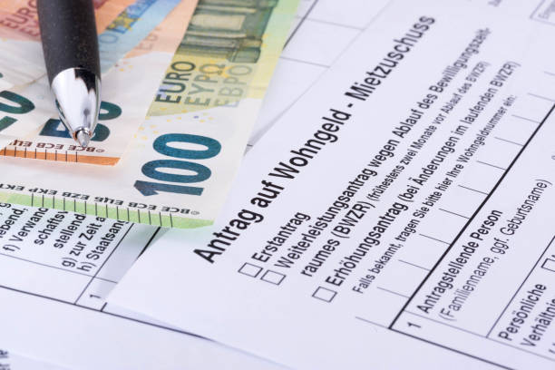 istock Euro banknotes and application for housing benefit in Germany 1645563273