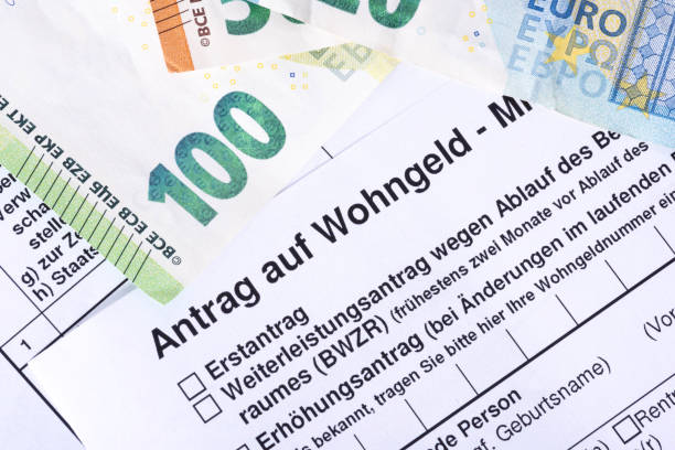 istock Euro banknotes and application for housing benefit in Germany 1645563789