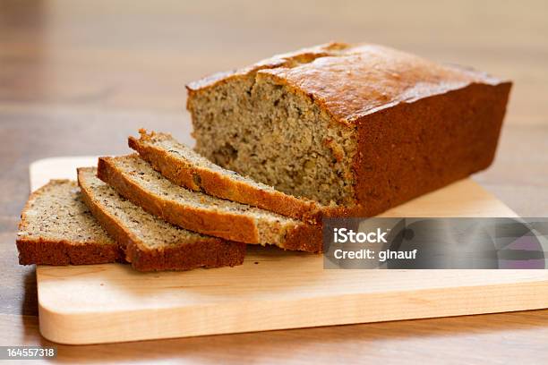 Banana Nut Bread Plain Stock Photo - Download Image Now - Banana Bread, Cutting Board, Slice of Food