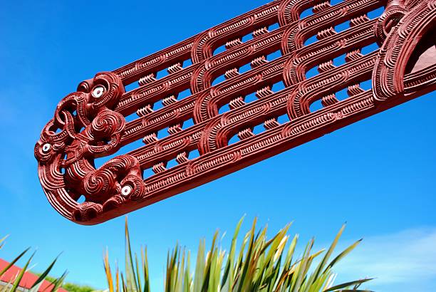 Maori Carving, Harakeke & Sky  motueka photos stock pictures, royalty-free photos & images