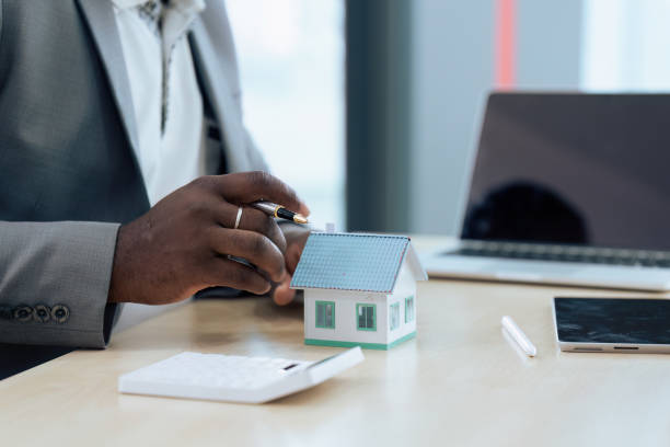 istock Real Estate Agent and client talking about Property insurance and security concept about house to client before sign contract 1645600657