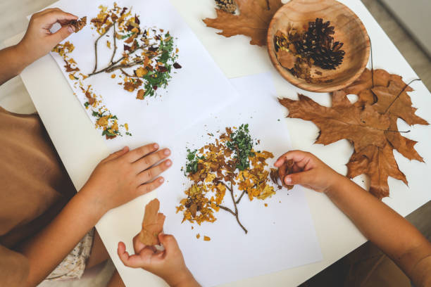 istock Children's creative activities, autumn idea 1645601725