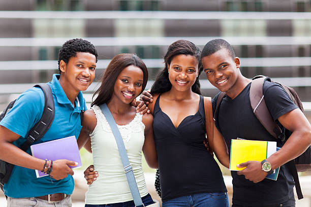 happy african college friends stock photo