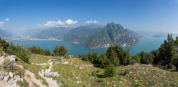 Amazing landscape at Lake Iseo from the mountain. An alpine lake in north of Italy. Famous tourist destination. Natural contest