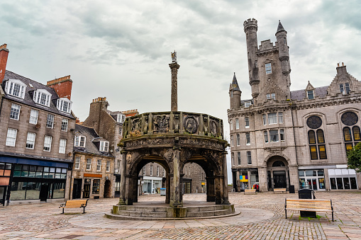 Mercat cross, tourist spot in a square in the center of the city of Aberdeen, Scotland