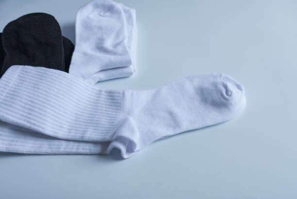 istock A pair of white socks on a white background. 1645728388
