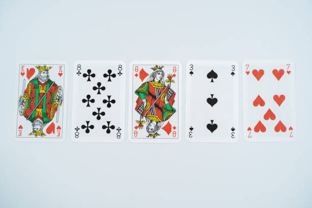 istock High card playing cards isolated on white background. 1645738704