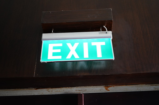 Exit sign in a corridor