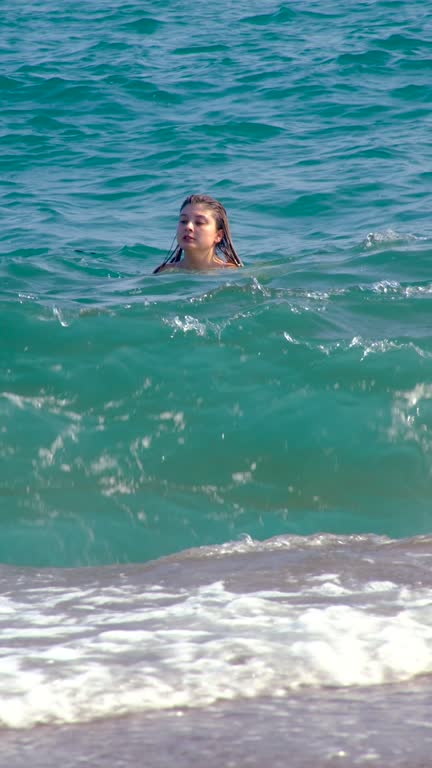A beautiful mermaid vacations in the Mediterranean