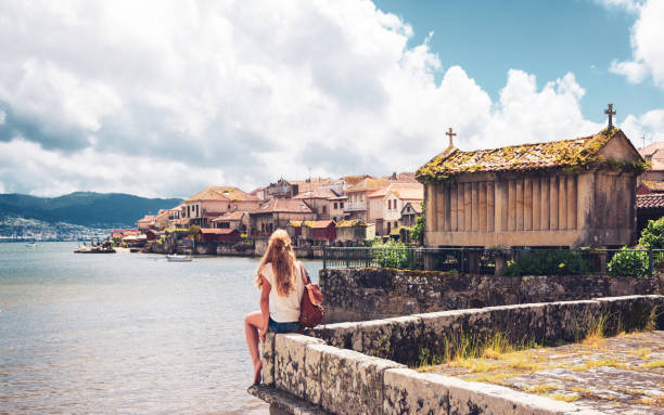 Woman tourist in Combarro- Spain, Galicia- travel destination - fotografia de stock