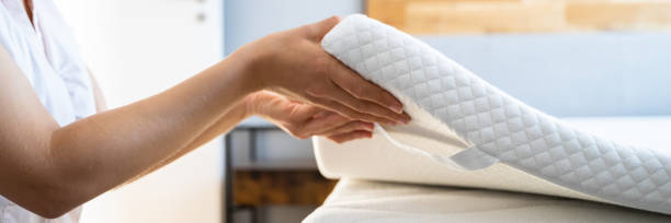 istock Mattress Topper Being Laid On Top 1645853011