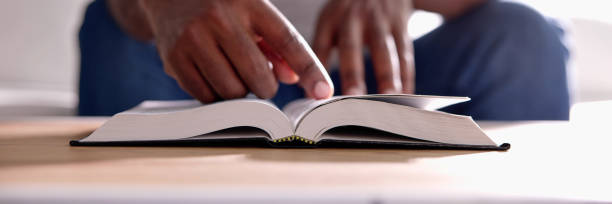 istock American African Prayer Man Studying Bible Book 1645853090