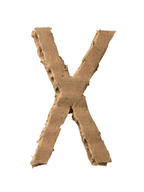 буква x вырезана из картонной бумаги - document paper cutting tearing стоковые фото и изображения