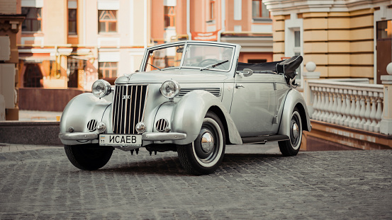 Kyiv, Ukraine - August 10 2014: 1930s vintage german cabriolet car, three quarter front view parked on city street