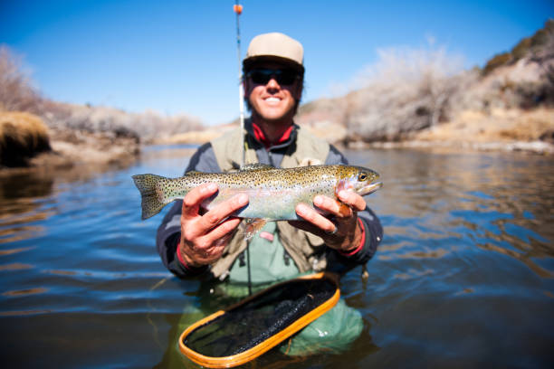 istock Happy Trout Fisherman 164589901