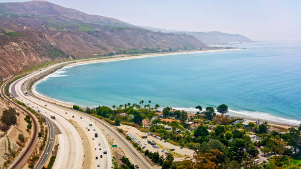istock Vehicles driving on coastal road 1645947673