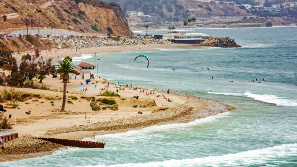 istock Tourist enjoying on beach 1645947674