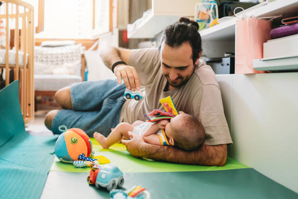 istock A father is playing with his son at home 1645967197