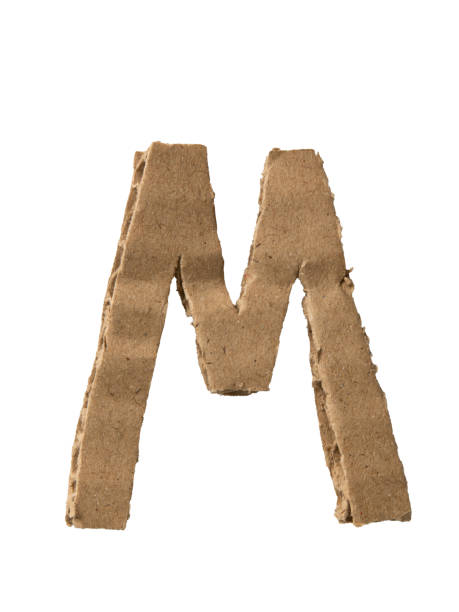 буква м, вырезанная из картонной бумаги - document paper cutting tearing стоковые фото и изображения
