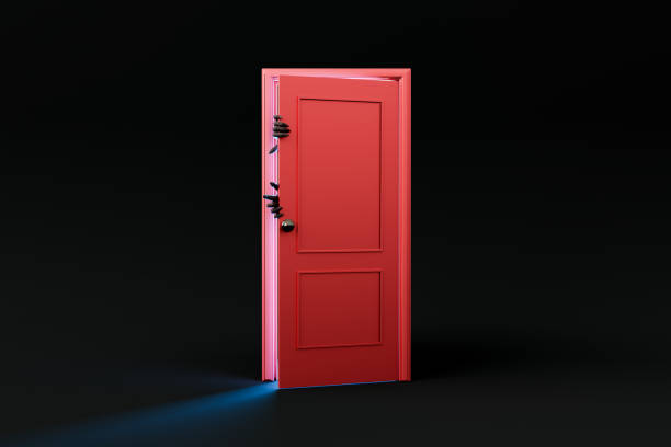 istock red door with diabolical hands peeking out 1645988394