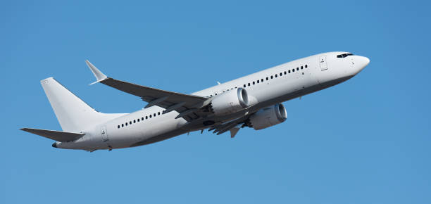 istock Airplane take off on the blue sky, Aircraft flying on sky background 1646002453