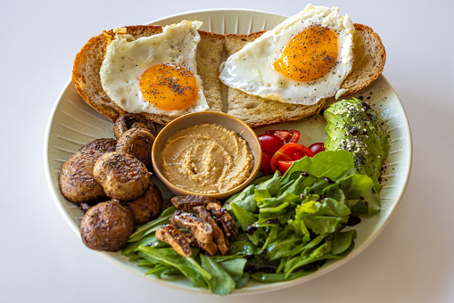 Egg, avocado tomato salad leaves. Healthy vegetarian lunch breakfast
