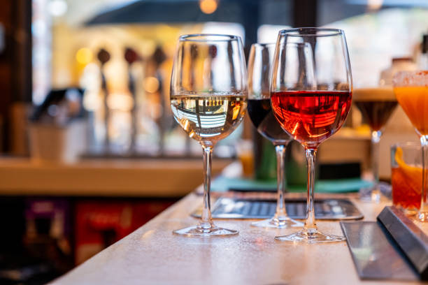 istock Wine Glasses on a Bar Counter 1646028030