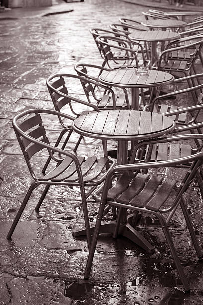 Cafe Tables and Chairs, Florence, Italy in Black and White Sepia Tone